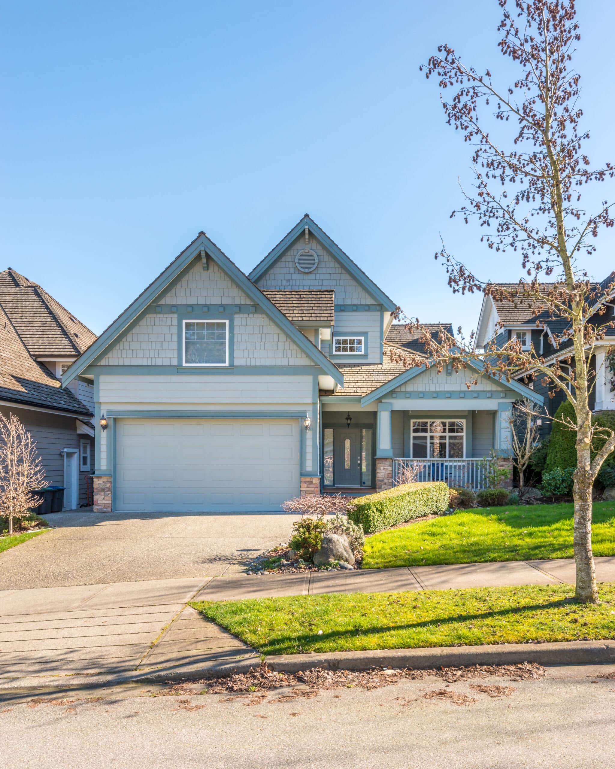 Houses in suburb at Spring in the north America. Luxury houses with nice landscape.